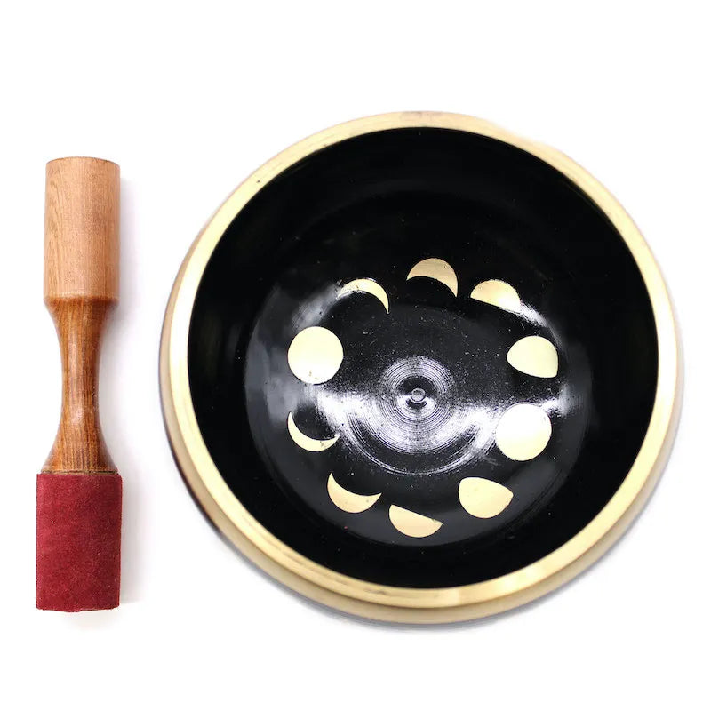 bol chantant avec motifs dorés : Lune, et maillet en bois avec revêtement