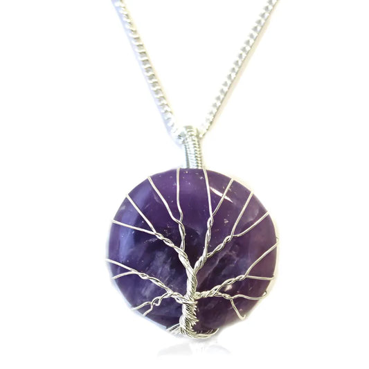 pendentif en pierre polie et fil torsadé motif arbre de vie et améthyste